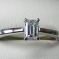 Solitaire emerald cut diamond engagement ring