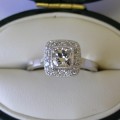 Platinum cushion cut diamond halo engagement ring