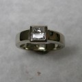 Solitaire bezel set princess cut diamond engagement ring