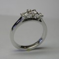 Three princess cut diamond engagement ring