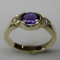 Natural purple sapphire and diamond dress ring