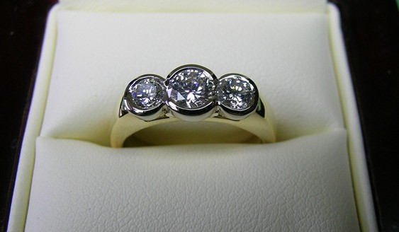 Three brilliant cut diamond engagement ring