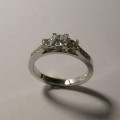 Three princess diamond engagement ring