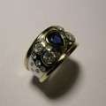Contemporary style sapphire and diamond dress ring