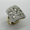 Antique style marquise and brilliant cut diamond dress ring