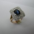 Antique style oval sapphire and diamond ladies dress ring