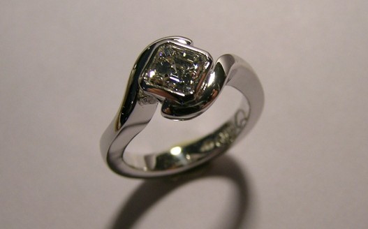 Platinum solitaire square emerald cut diamond engagement ring