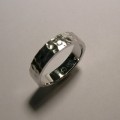 Contemporary gents platinum wedding ring with hammered finish