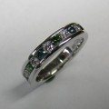 Channel set green blue and white diamond ladies ring