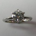 Elegant platinum solitaire diamond engagement ring