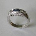 Emerald cut sapphire and diamond antique style ring