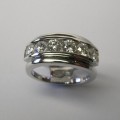 Stylish channel set brilliant cut diamond dress ring