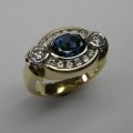 Oval sapphire and diamond ladies dress ring