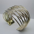 Contemporary style gold cuff bangle