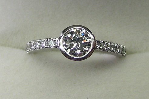 Platinum round brilliant cut diamond engagement ring