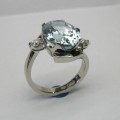 Oval aquamarine and diamond ladies dress ring