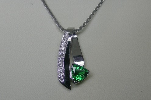 Tsavorite garnet and diamond pendant
