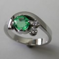 Natural emerald and diamond ladies dress ring
