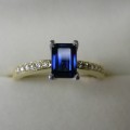 Emerald cut Australian sapphire and diamond engagement ring