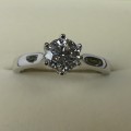 Solitaire round brilliant cut diamond engagement ring