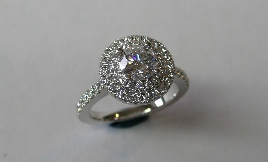 Double halo round brilliant cut diamond engagement ring