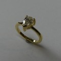 Pear shaped diamond solitaire engagement ring