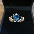 Heart shaped blue topaz claddagh ring