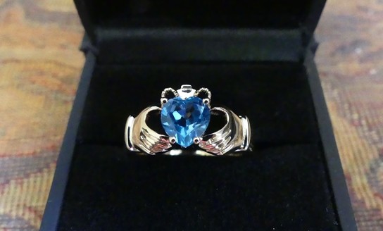 Heart shaped blue topaz claddagh ring