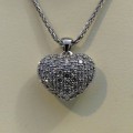 Pave set diamond heart shape pendant