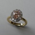 Oval pink diamond halo occasion ring