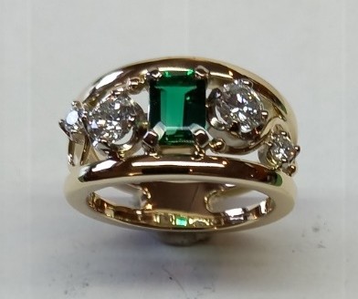 Contemporary style Emerald and Diamond dress ring