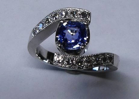Cushion cut Sapphire and Diamond dress ring